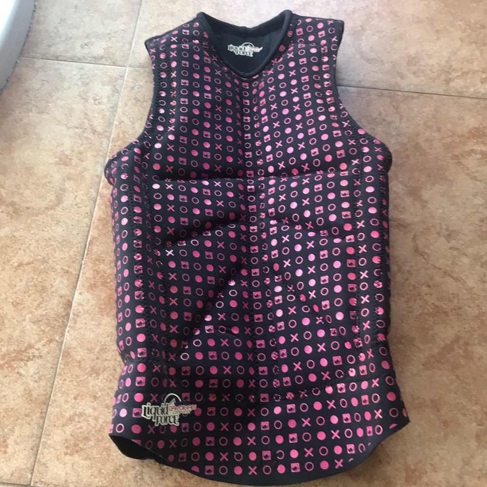 A girls pull over cardigan compvest (life vest)